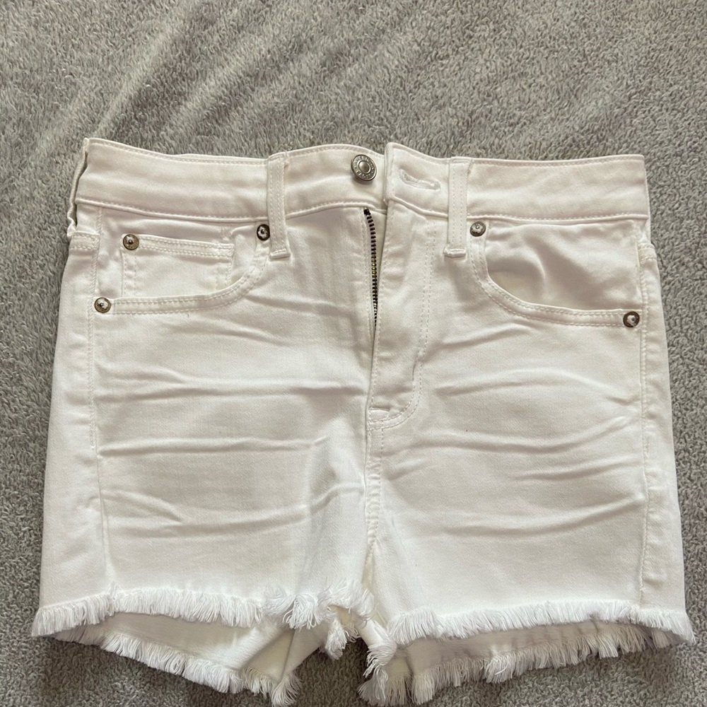 White ripped bottoms